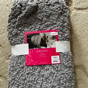 Gray throw blanket.